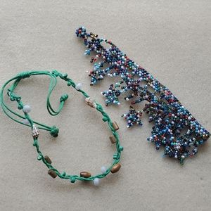 Bundle of 2 beaded anklets.